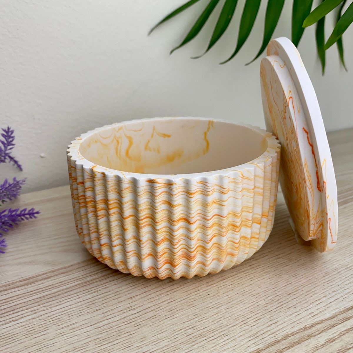 Striped container with lid